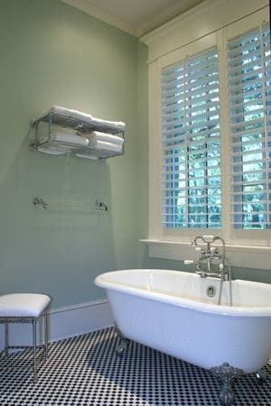 Beautiful bathroom with an old style footed tub and new pipes